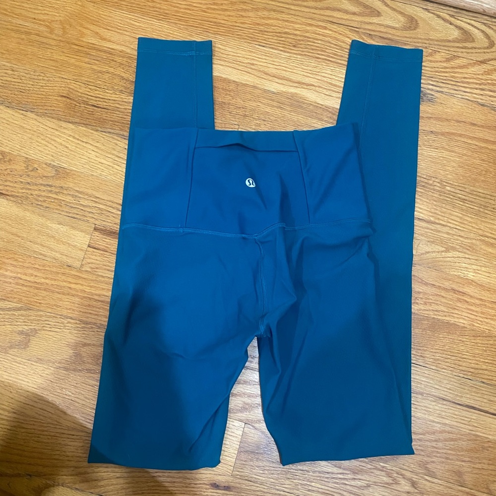 Lululemon mapped out high us 28” tight Laguna size 4. Like new